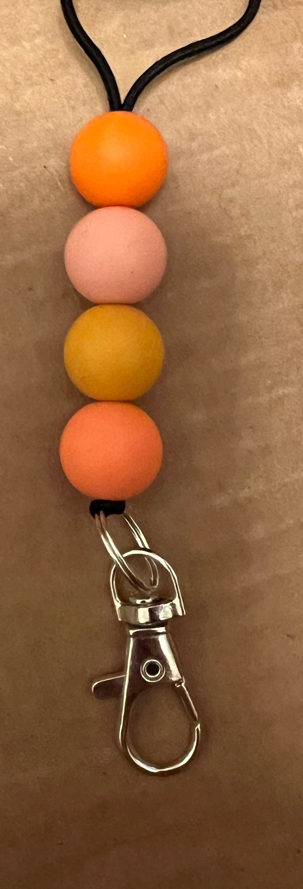 Assorted Orange Beaded Hanger